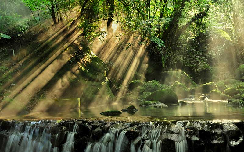 sun-over-waterfall